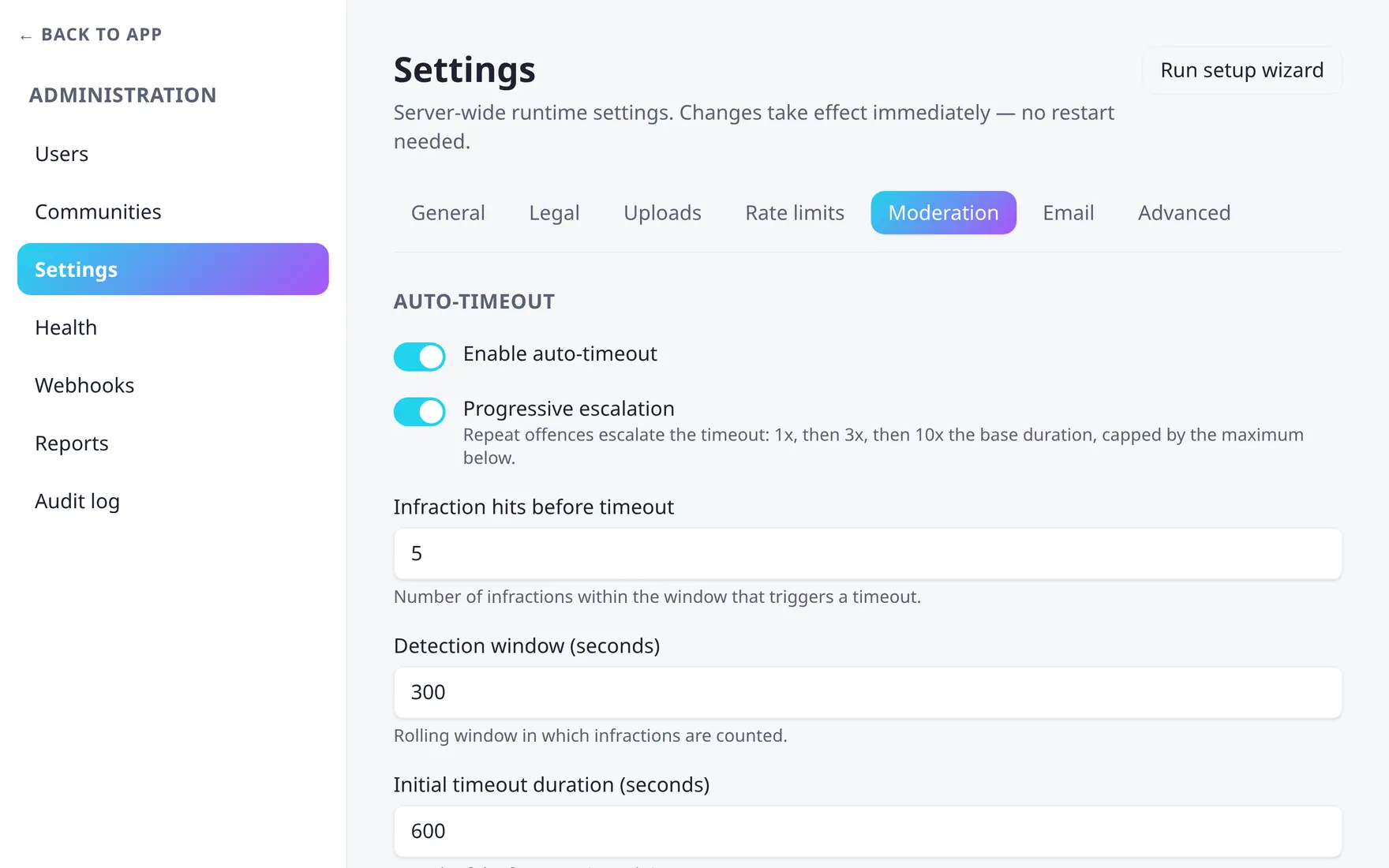 The Moderation tab of admin settings showing auto-timeout thresholds and the anti-spam registration check